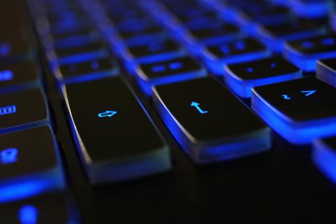 glowing keyboard - shield companies from cybercrime