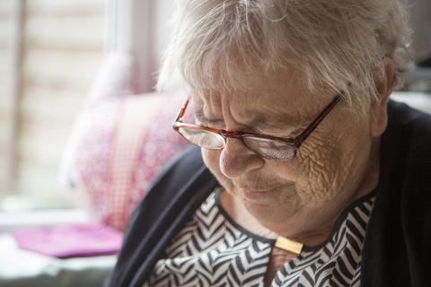 portrait-of-an-old-woman-with-glass